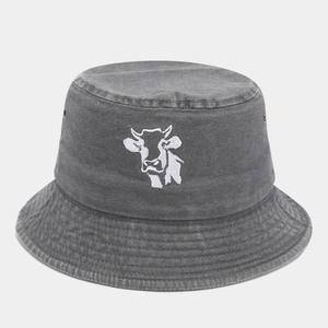 Dark gray washed cotton bucket hat with white cow embroidery and metal eyelets