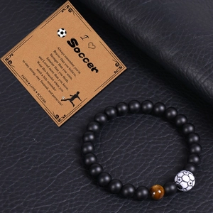 8mm soccer bracelet with matte black beads and tiger eye stone on message card