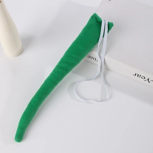 Detailed view of green plush costume tail with elastic loop for animal cosplay