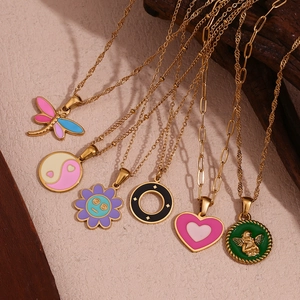 Chic 18K gold plated titanium steel necklaces with colorful enamel pendants on wood