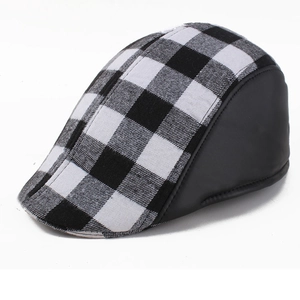 British style checkered newsboy cap with black leather trim and vintage plaid design