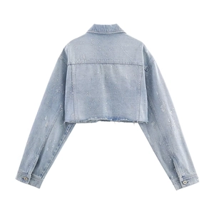 Veste en jean courte bleu clair pour femme avec strass brillants et ourlet effiloché tendance