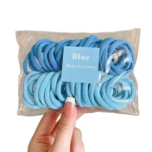 50-piece set of blue high-elastic seamless hair ties in a clear storage pouch