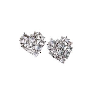 Sparkling silver heart stud earrings with multi-cut cubic zirconia on white background