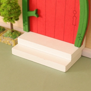 Miniature white wooden stairs with red and green doors for dollhouse Christmas scene DIY