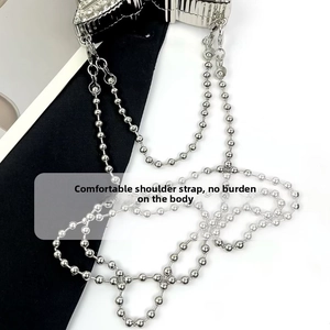 Close-up of a silver metal ball chain strap with a secure lobster clasp attachment