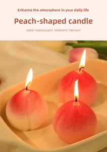 Close-up of three lighted peach shaped candles with realistic texture and warm glow