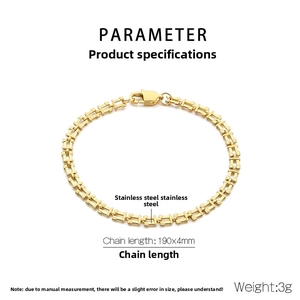 Detail of a 190x4mm gold stainless steel music note chain bracelet on a white background