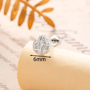 Sweet hollow star earring with 6mm cubic zirconia in a minimalist silver finish