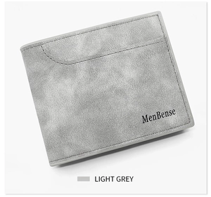 Detail view of light grey matte leather short wallet with card slots and stitching