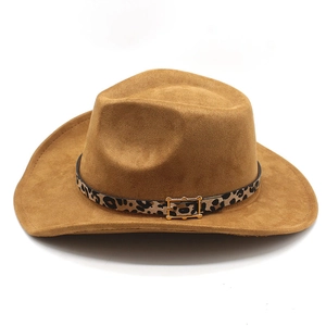 Macro detail of brown faux suede cowboy hat with leopard print band and gold buckle