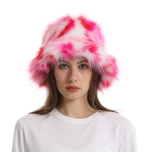 Detail of pink and white faux fur bucket hat showing soft plush texture and camouflage pattern