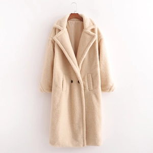 Mid-length cream faux fur teddy coat with wide lapels and button closure details