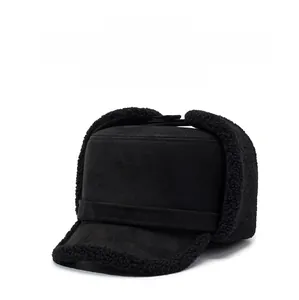 Close-up of the plush lamb wool lining on a black winter ear-flap baseball cap