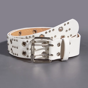 Detail of white punk belt featuring double rows of silver grommets and metal studs