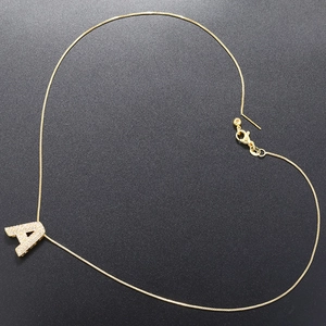 Gold letter A necklace with micro-paved cubic zirconia pendant arranged in heart shape