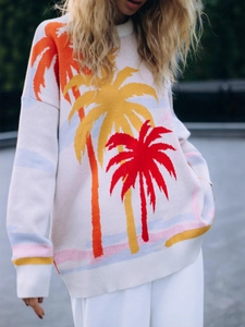 Women's oversized knit sweater with colorful tropical coconut tree jacquard pattern