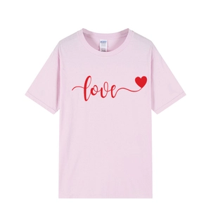 Light pink cotton crew neck T-shirt featuring a red hand-written love script and heart