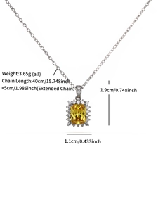 Detail shot of silver necklace with yellow square zircon pendant and size specifications