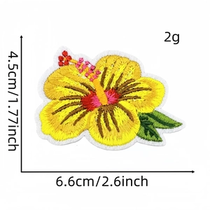 Detailed size view of yellow hibiscus flower embroidery patch with green leaves and dimensions