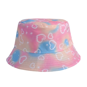 Detail of children's tie-dye bucket hat with pink blue gradient and heart patterns