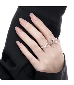 Close-up of S925 sterling silver square diamond ring and marquise gemstone design