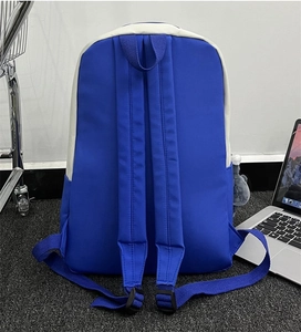 Detail of adjustable straps on a blue and beige durable casual school backpack