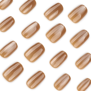 Glossy amber cat-eye press-on nails in short squoval shape on a clean white background