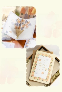 Detailed view of 3D floral greeting card set with kraft envelope and raffia gift box