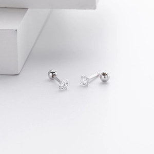 Detailed macro view of S925 sterling silver screw back earrings with clear zircon stones