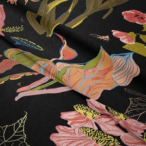 Macro detail of botanical print on black fabric with vintage floral numbering and texture