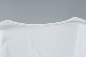 Detailed view of white square neck T-shirt with premium lace trim and stitching details