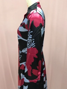 Side view of an A-line floral dress with high neck and vibrant digital prints