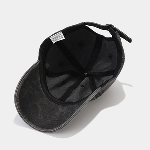Inside view of washed cotton baseball cap with adjustable metal buckle and sun moon print