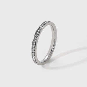 Minimalist 2mm silver titanium steel eternity ring with small sparkling cubic zirconia diamonds