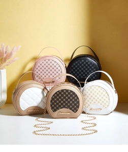 Collection de mini sacs ronds en diverses couleurs avec poignées en métal et bandoulières