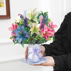 Detailed close-up of a 3D pop-up greeting card featuring a colorful lily flower bouquet