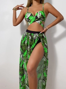 Detail of three-piece green tropical print bikini set featuring a sheer mesh maxi skirt