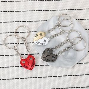 Magnetic split heart keychains with Best Friends engraving in gold, black, and red colors
