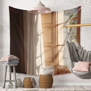 Close-up of bohemian tapestry with sunlit window scene on a textured grey wall