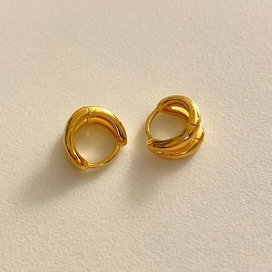 Minimalist gold-plated 925 sterling silver double-layer earrings on a cream background