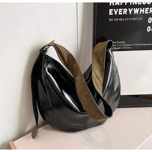 Glossy black PU hobo bag with contrast olive green suede strap and metal rings
