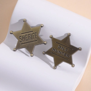 Set of two vintage bronze hexagonal star badges with Sheriff and Dilf Hunter engravings