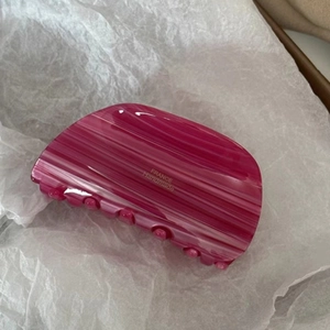 Pink acetate claw clip with France Handmade text on white tissue paper background
