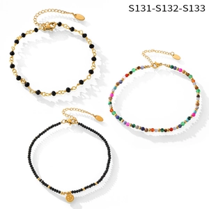 Detailed view of colorful natural stone beaded anklets with 18k gold plated charms