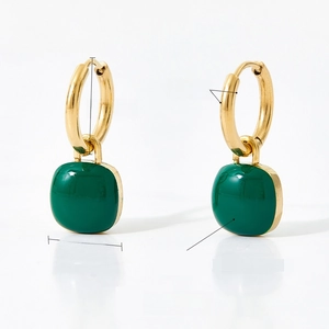 Macro view of gold hoop earrings with green square enamel pendants and dimensions