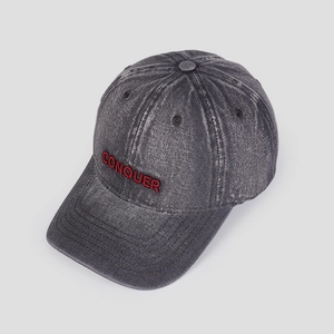 Vintage washed dark grey denim baseball cap with red embroidered Conquer lettering
