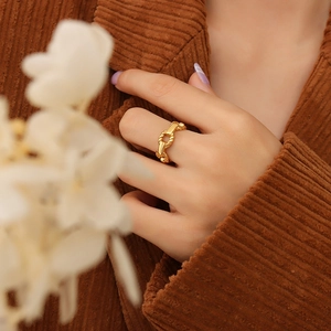 Hip-hop style hollow chain ring in 18K gold plated titanium steel worn by model
