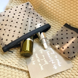 Translucent heart mesh makeup bag set with zipper for travel and cosmetics storage