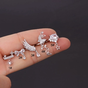 Bow and feather zircon ear bone clip earrings in a minimalist silver style